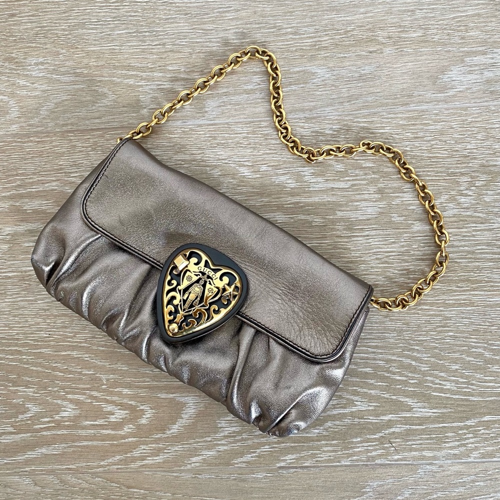 Beautiful Gucci Babouska Metallic bronze bag with Gold hardware.